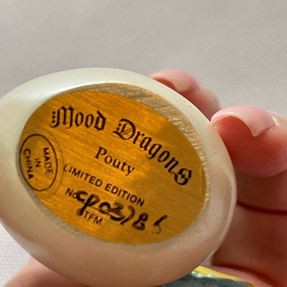 Adorable little dragon holding a blue gem. Approximately 3 inches. - Picture 3 of 4